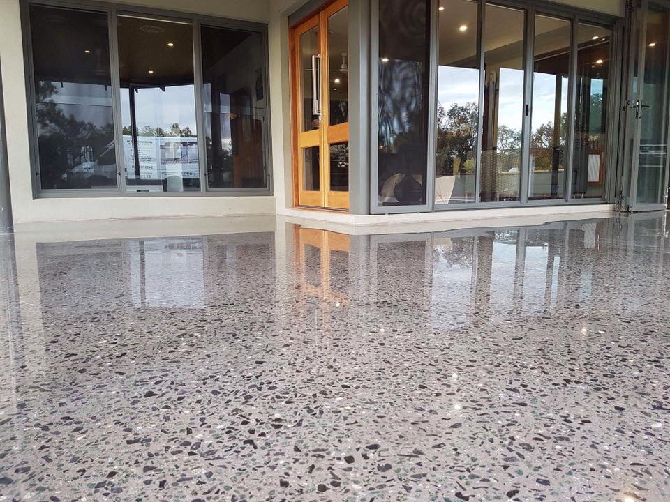 Polished concrete patio outside a modern home